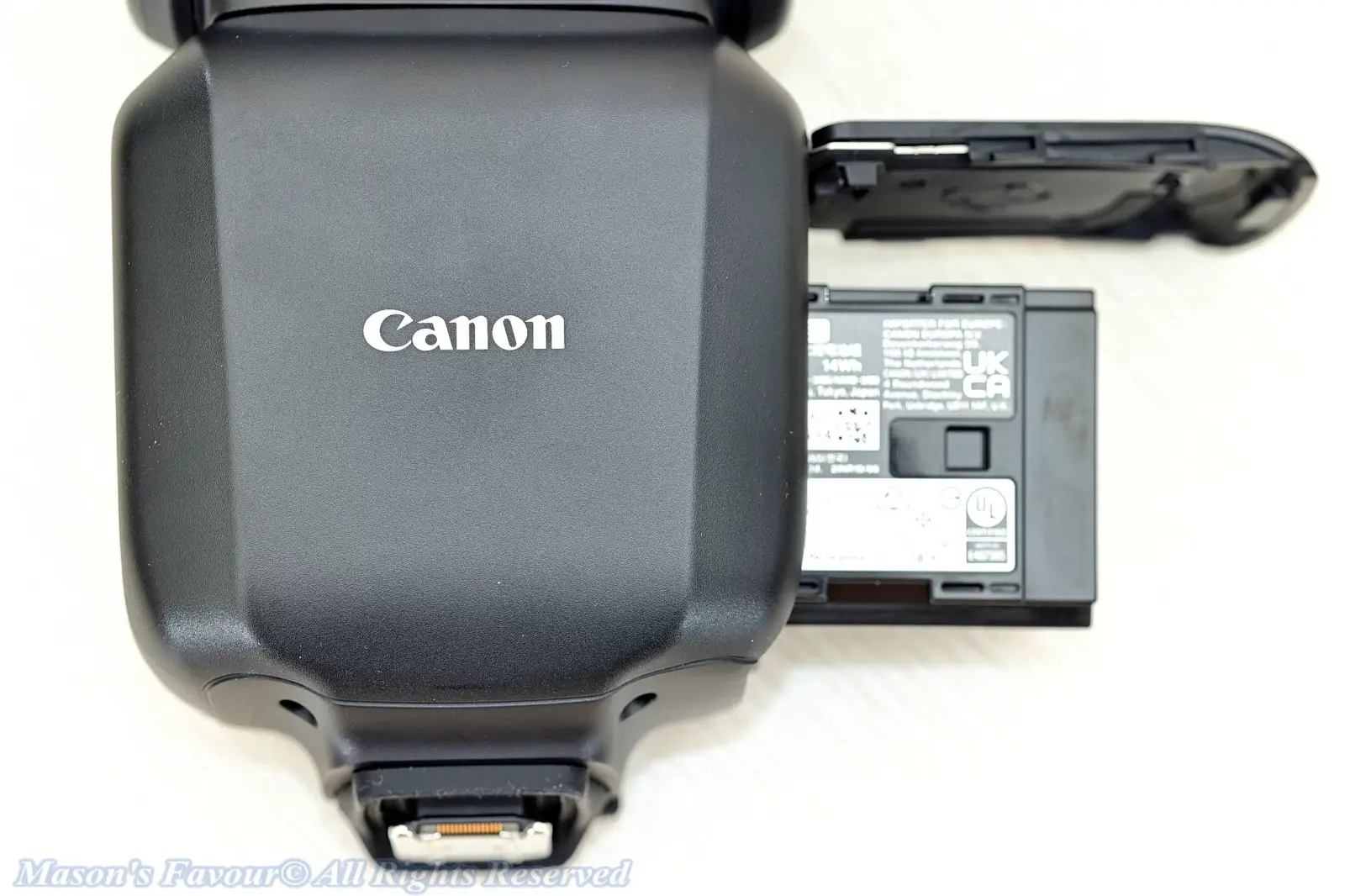 Canon-Speedlite-EL-5 - LP-EL Battery slided back to the Battery Compartment