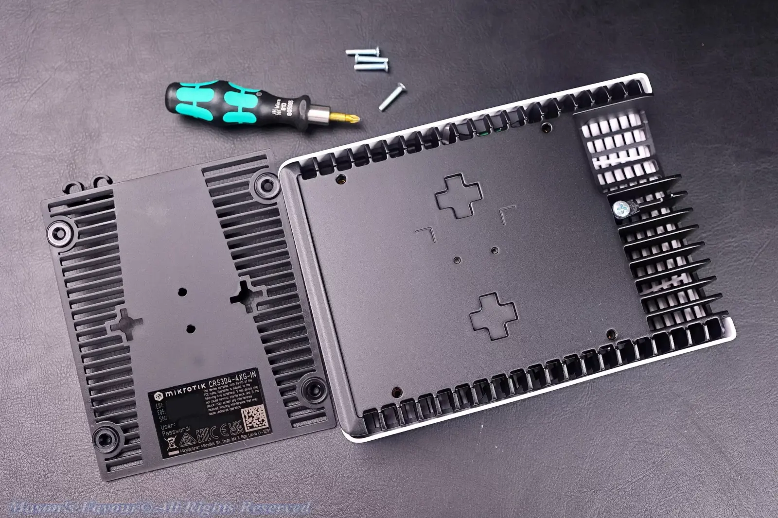 MikroTik CRS304-4XG-IN - Partial Teardown, with the Bottom Plastic Bracket removed