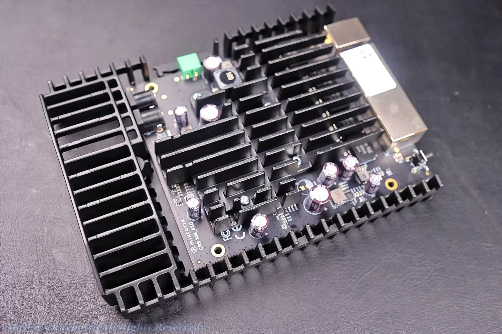 MikroTik CRS304-4XG-IN - Teardown, with the Top White Plastic Cover removed, Perspective 2