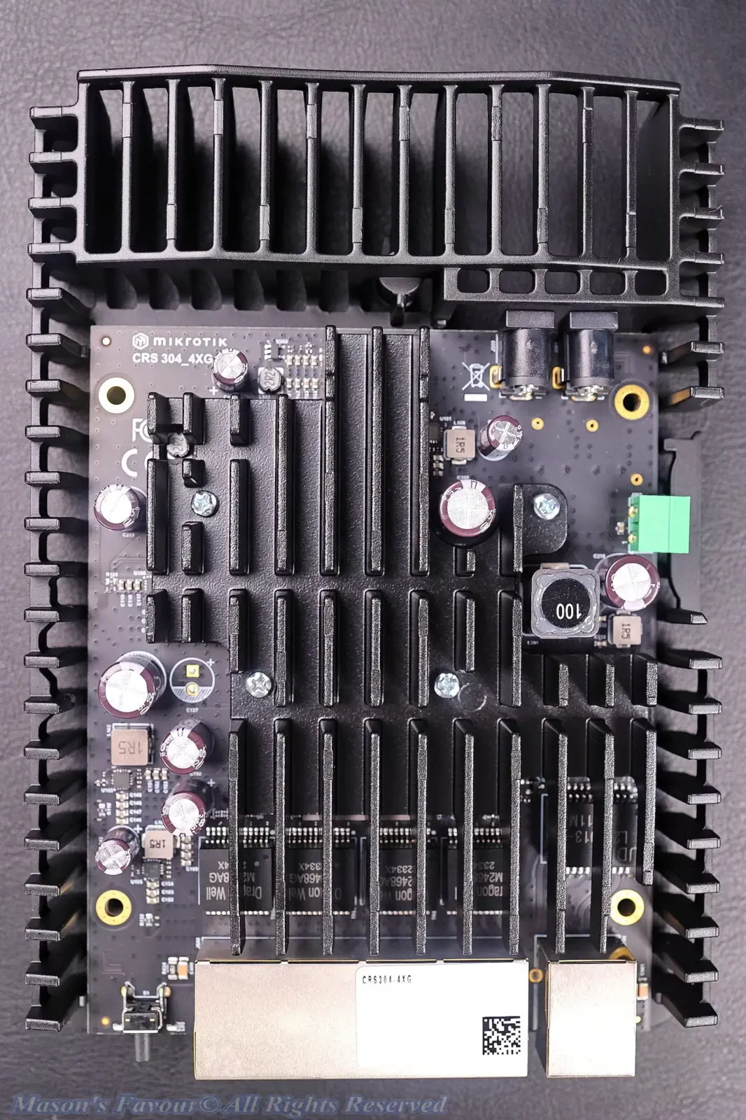 MikroTik CRS304-4XG-IN - Teardown, with the Top White Plastic Cover removed, Top