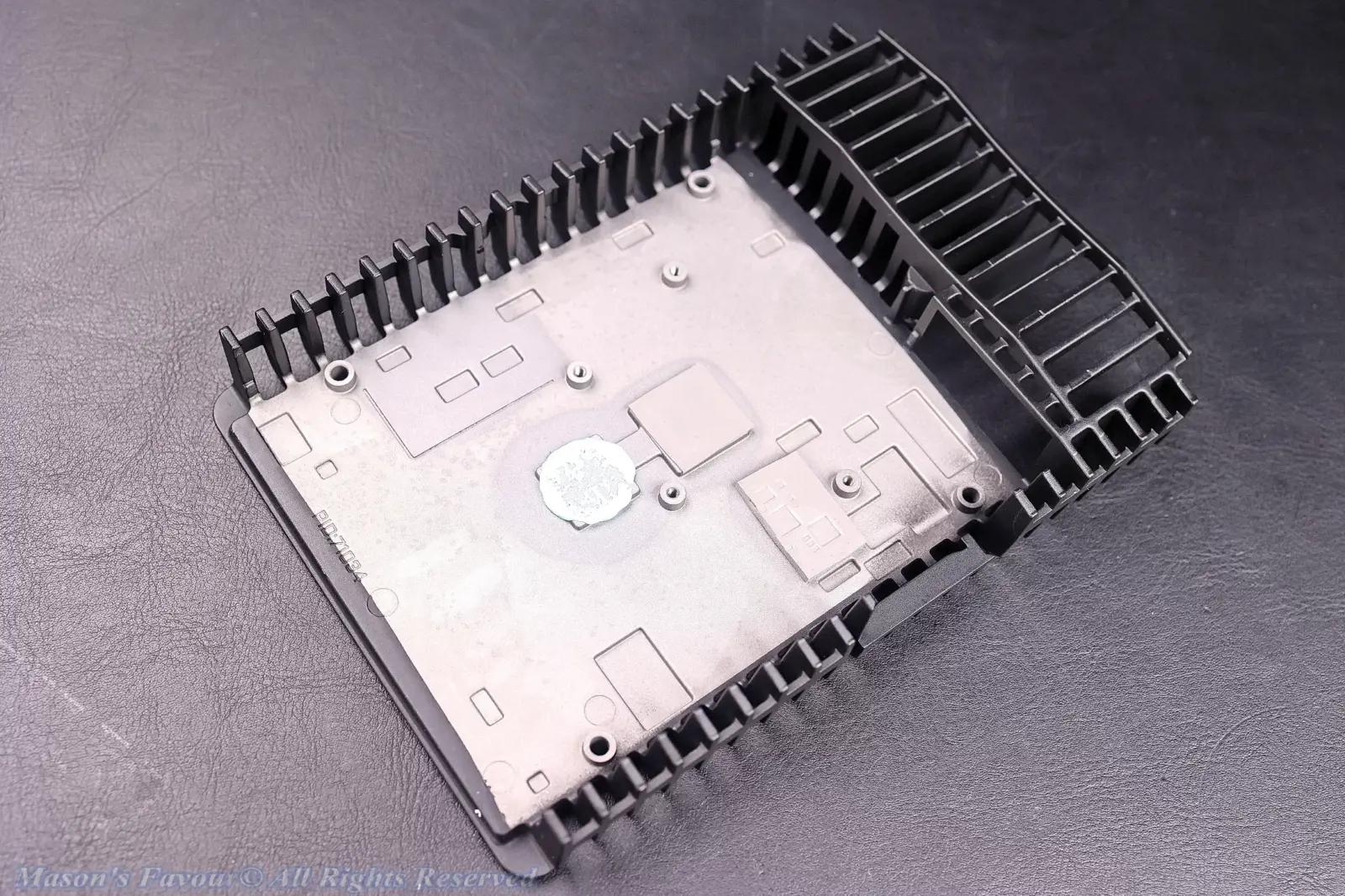 MikroTik CRS304-4XG-IN - Bottom Heatsink Base, Perspective 1