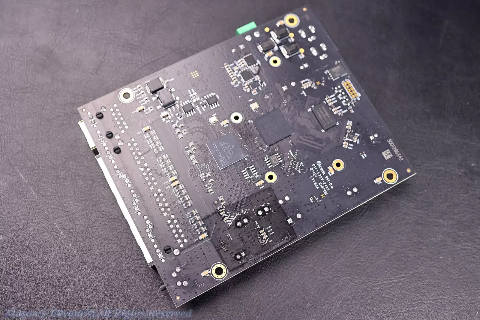MikroTik CRS304-4XG-IN - Bottom Side of the PCB, with the Marvell 98DX2528 ARM 64bit SOC Chip, Perspective 1