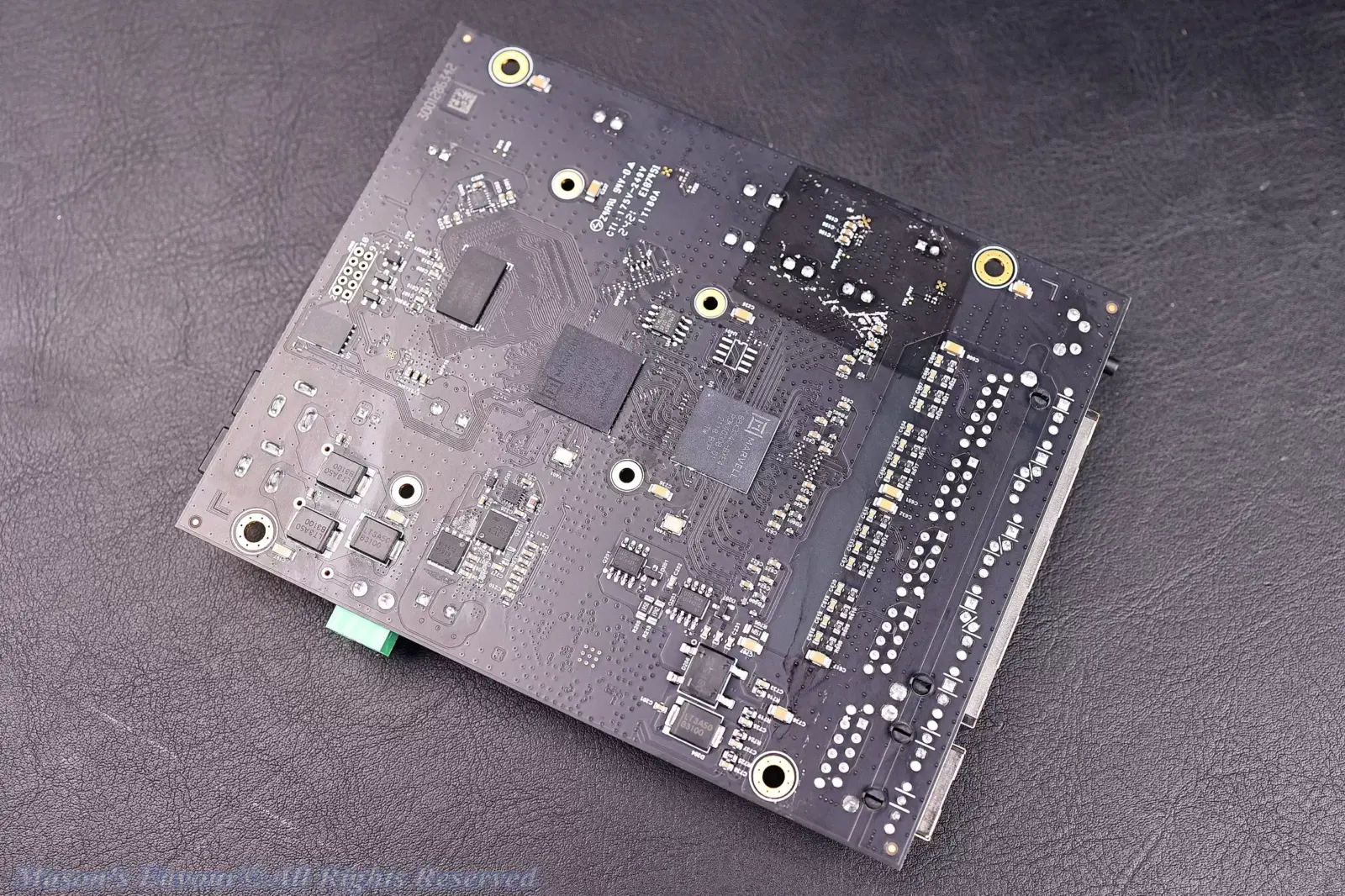 MikroTik CRS304-4XG-IN - Bottom Side of the PCB, with the Marvell 98DX2528 ARM 64bit SOC Chip, Perspective 2
