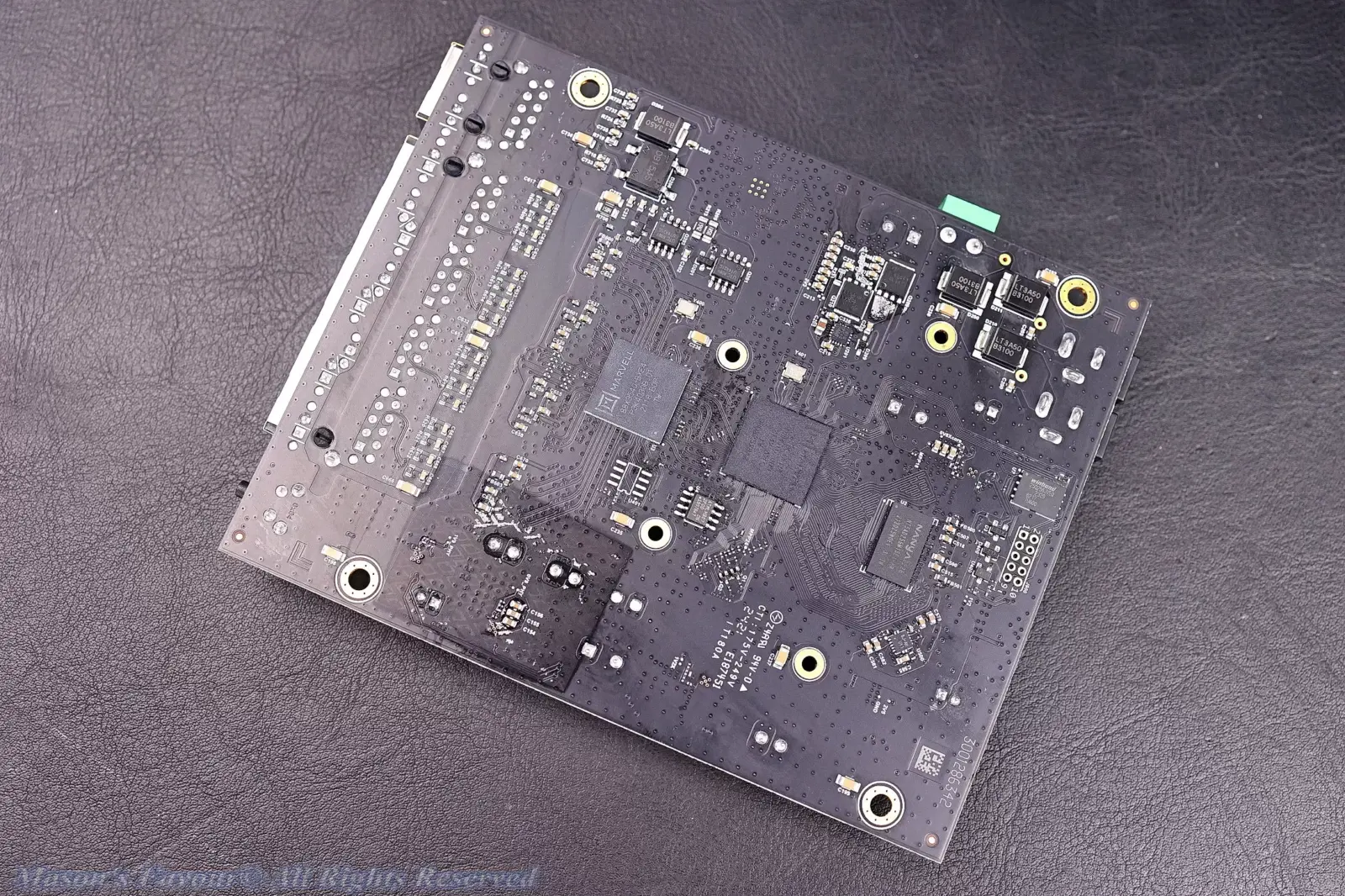 MikroTik CRS304-4XG-IN - Bottom Side of the PCB, with the Marvell 98DX2528 ARM 64bit SOC Chip, Perspective 4