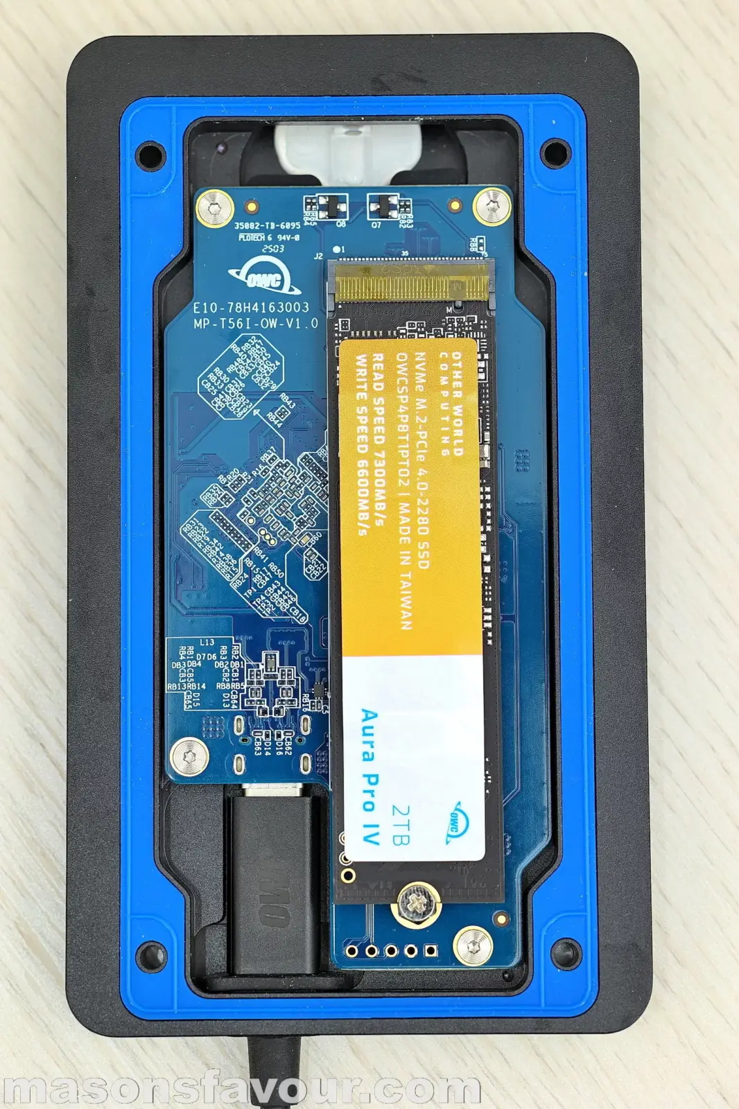 OWC Envoy Ultra Thunderbolt 5 SSD - Bottom Base Heatsink, PCB, and Aura Pro IV SSD 2TB, Top View