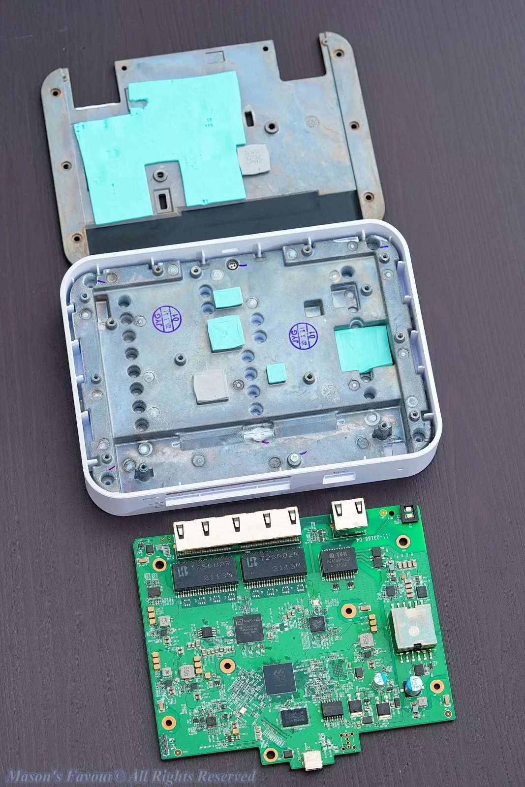 Ubiquiti UniFi Flex XG 10Gbe Switch - PCB Disassembled from Top Casted Metal Heatsink Piece, Chip Revealed