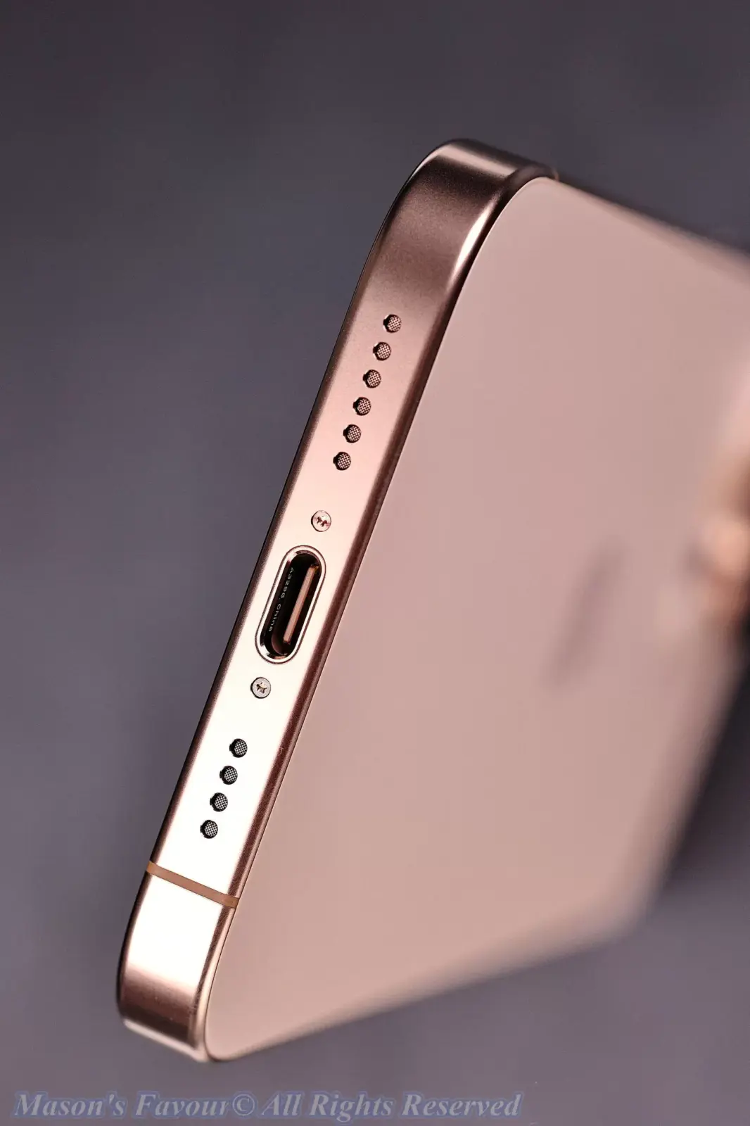 iPhone 16 Pro Max, Desert Titanium - Perspective 4, USB-C Port and Speakers