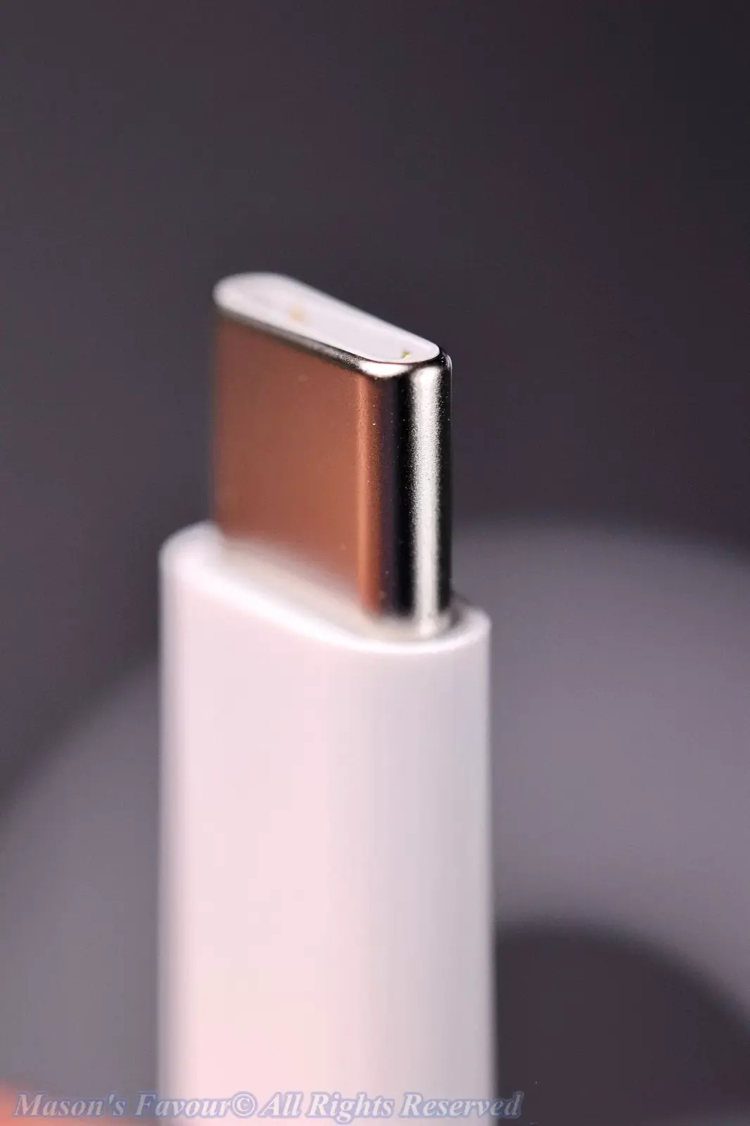 iPhone 16 Pro Max, Desert Titanium - Enlarged View, USB-C Cable Connector